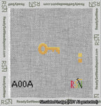 A taped needlepoint canvas with the design: Circle Gold Key.