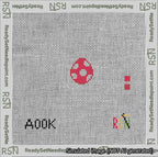 A taped needlepoint canvas with the design: Circle Red Yoshi Egg.