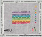 A taped needlepoint canvas with the design: Geometric Rainbow Bag Tag.