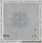 A taped needlepoint canvas with the design: 8-Pointed Mandala Outline Blue.