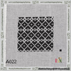 A taped needlepoint canvas with the design: Symmetrical Heart Grid White on Black.