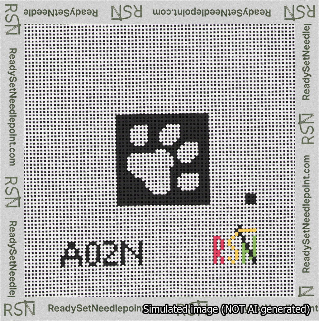 A taped needlepoint canvas with the design: Square Dog Paw Print White on Black.