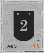 A taped needlepoint canvas with the design: Banner 13 mesh count Curved 2 White on Black.