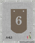 A taped needlepoint canvas with the design: Banner 13 mesh count Curved 6 White on Brown.