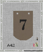 A taped needlepoint canvas with the design: Banner 13 mesh count Curved 7 Black on Brown.