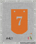 A taped needlepoint canvas with the design: Banner 13 mesh count Curved 7 White on Orange.