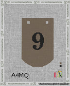 A taped needlepoint canvas with the design: Banner 13 mesh count Curved 9 Black on Brown.