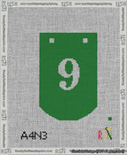 A taped needlepoint canvas with the design: Banner 13 mesh count Curved 9 White on Green.