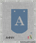 A taped needlepoint canvas with the design: Banner 13 mesh count Curved A White on Blue.