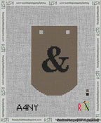 A taped needlepoint canvas with the design: Banner 13 mesh count Curved Ampersand Black on Brown.