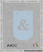 A taped needlepoint canvas with the design: Banner 13 mesh count Curved Ampersand White on Light Blue.