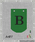A taped needlepoint canvas with the design: Banner 13 mesh count Curved B Black on Green.
