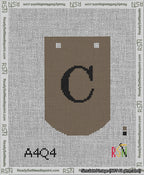 A taped needlepoint canvas with the design: Banner 13 mesh count Curved C Black on Brown.