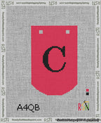 A taped needlepoint canvas with the design: Banner 13 mesh count Curved C Black on Red.