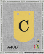 A taped needlepoint canvas with the design: Banner 13 mesh count Curved C Black on Yellow.