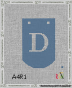 A taped needlepoint canvas with the design: Banner 13 mesh count Curved D White on Blue.