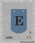 A taped needlepoint canvas with the design: Banner 13 mesh count Curved E Black on Blue.