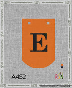 A taped needlepoint canvas with the design: Banner 13 mesh count Curved E Black on Orange.