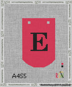 A taped needlepoint canvas with the design: Banner 13 mesh count Curved E Black on Red.