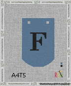 A taped needlepoint canvas with the design: Banner 13 mesh count Curved F Black on Blue.