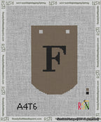A taped needlepoint canvas with the design: Banner 13 mesh count Curved F Black on Brown.