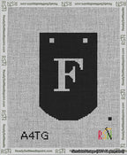 A taped needlepoint canvas with the design: Banner 13 mesh count Curved F White on Black.