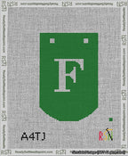 A taped needlepoint canvas with the design: Banner 13 mesh count Curved F White on Green.