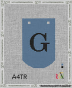 A taped needlepoint canvas with the design: Banner 13 mesh count Curved G Black on Blue.