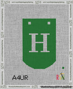 A taped needlepoint canvas with the design: Banner 13 mesh count Curved H White on Green.