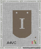 A taped needlepoint canvas with the design: Banner 13 mesh count Curved I White on Brown.