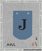 A taped needlepoint canvas with the design: Banner 13 mesh count Curved J Black on Blue.