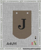 A taped needlepoint canvas with the design: Banner 13 mesh count Curved J Black on Brown.