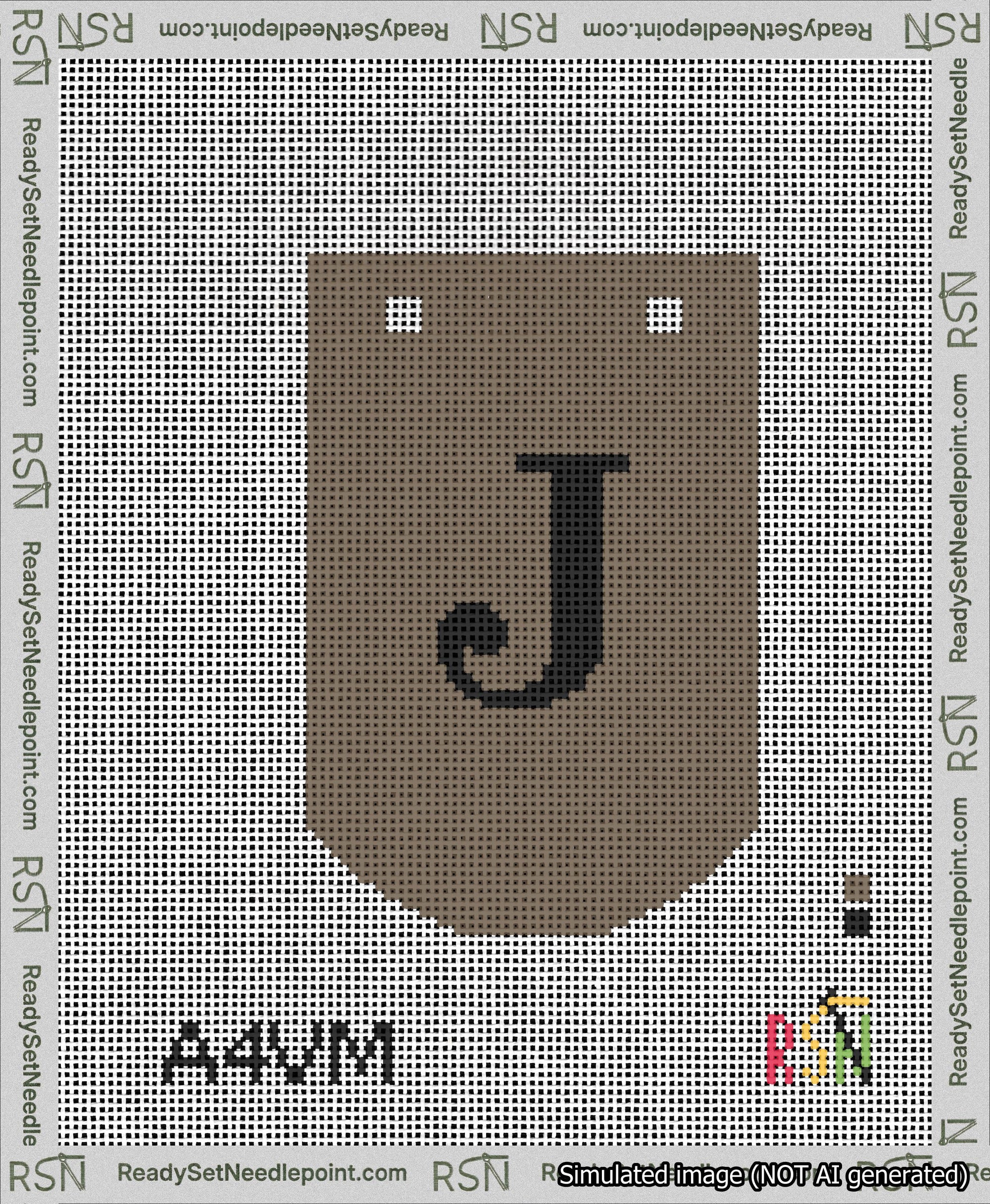 A taped needlepoint canvas with the design: Banner 13 mesh count Curved J Black on Brown.