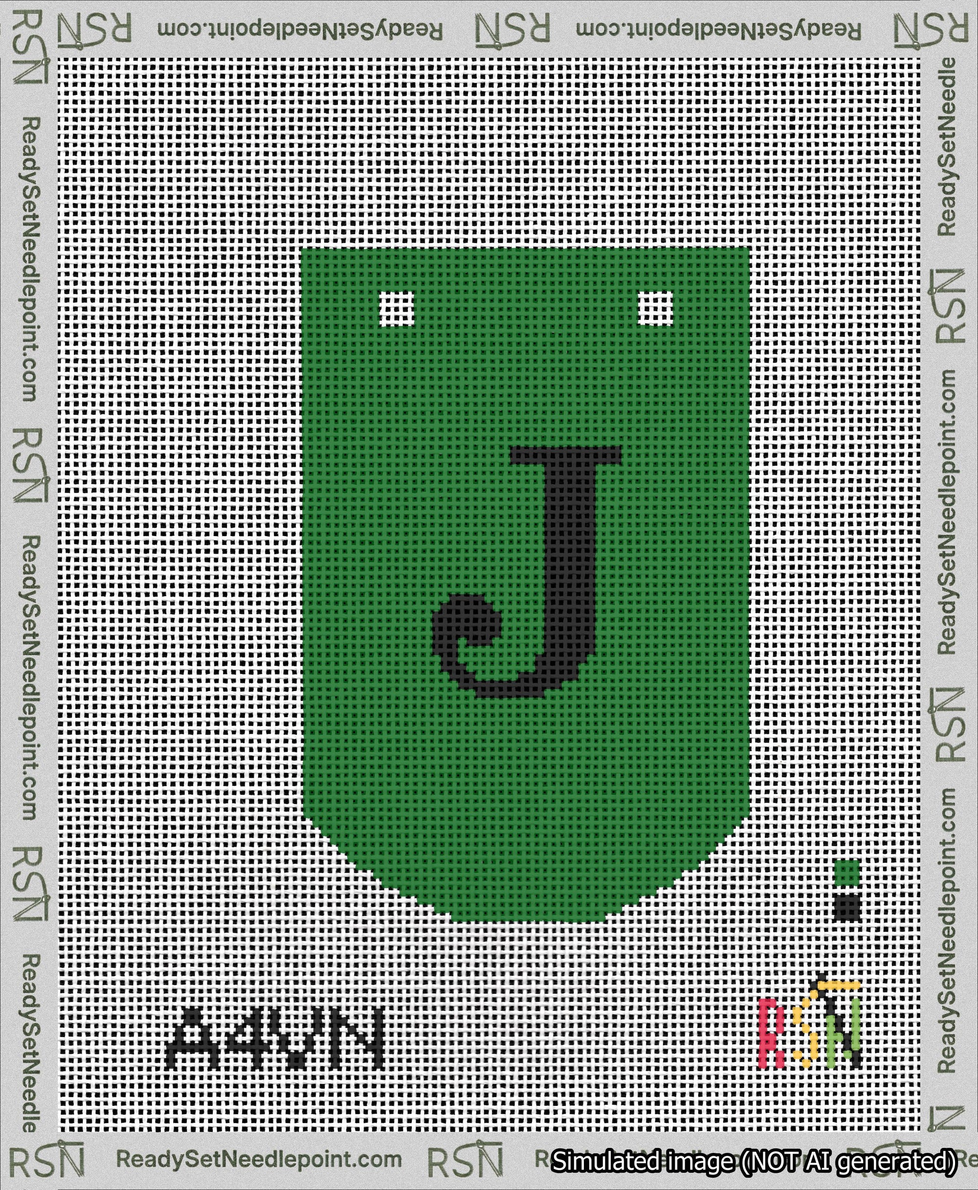 A taped needlepoint canvas with the design: Banner 13 mesh count Curved J Black on Green.