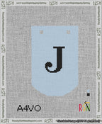 A taped needlepoint canvas with the design: Banner 13 mesh count Curved J Black on Light Blue.