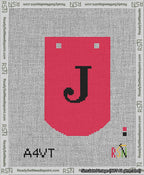 A taped needlepoint canvas with the design: Banner 13 mesh count Curved J Black on Red.