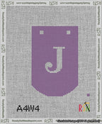 A taped needlepoint canvas with the design: Banner 13 mesh count Curved J White on Purple.