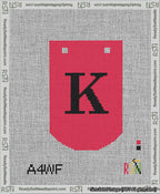 A taped needlepoint canvas with the design: Banner 13 mesh count Curved K Black on Red.