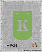A taped needlepoint canvas with the design: Banner 13 mesh count Curved K White on Light Green.