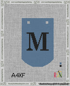 A taped needlepoint canvas with the design: Banner 13 mesh count Curved M Black on Blue.