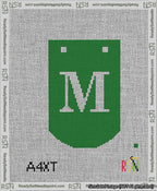 A taped needlepoint canvas with the design: Banner 13 mesh count Curved M White on Green.