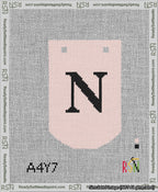 A taped needlepoint canvas with the design: Banner 13 mesh count Curved N Black on Pink.