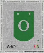A taped needlepoint canvas with the design: Banner 13 mesh count Curved O White on Green.