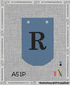 A taped needlepoint canvas with the design: Banner 13 mesh count Curved R Black on Blue.