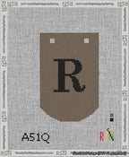 A taped needlepoint canvas with the design: Banner 13 mesh count Curved R Black on Brown.