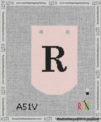A taped needlepoint canvas with the design: Banner 13 mesh count Curved R Black on Pink.
