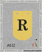 A taped needlepoint canvas with the design: Banner 13 mesh count Curved R Black on Yellow.