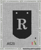 A taped needlepoint canvas with the design: Banner 13 mesh count Curved R White on Black.