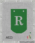 A taped needlepoint canvas with the design: Banner 13 mesh count Curved R White on Green.