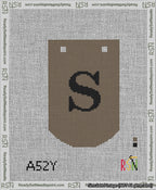 A taped needlepoint canvas with the design: Banner 13 mesh count Curved S Black on Brown.